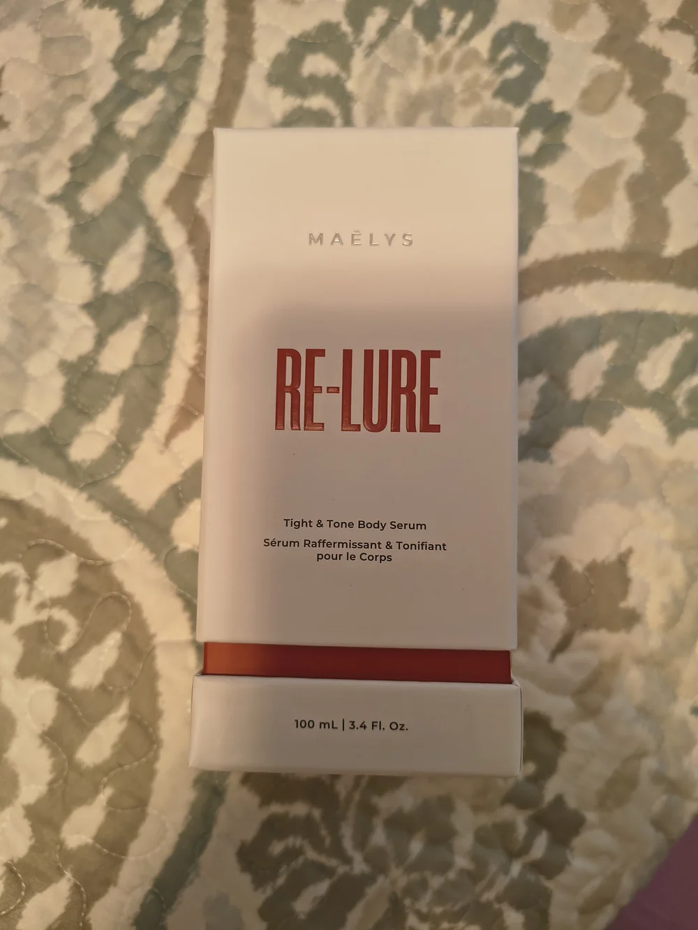 MAËLYS RE-LURE Tight & Tone Body Serum - White with Red Accents